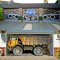 These Garage Door Decals Make It Look Like There's an Airplane, Horse, or Giant Dump Truck In Your Garage