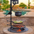 This Ultimate Fire Pit Has Tiered BBQ Grates and A Kettle Winch