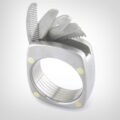 This Swiss Army Ring Has a Tiny Blade, Mustache Comb, and Bottle Opener
