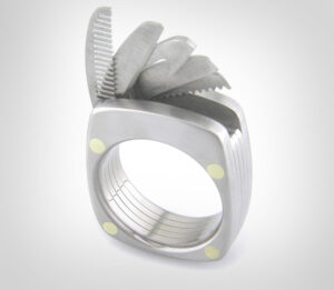 This Swiss Army Ring Has a Tiny Blade, Mustache Comb, and Bottle Opener