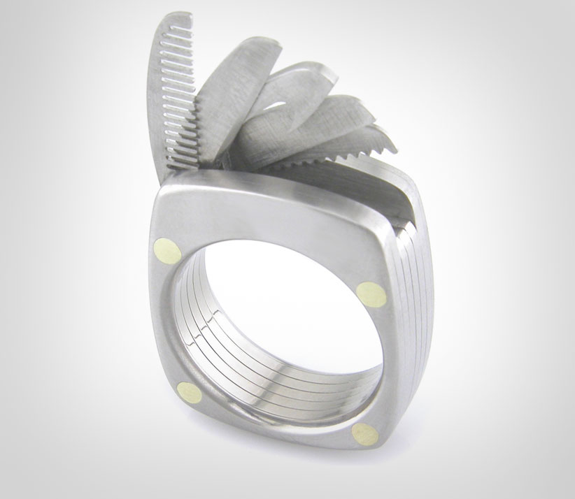 This Swiss Army Ring Has a Tiny Blade, Mustache Comb, and Bottle Opener