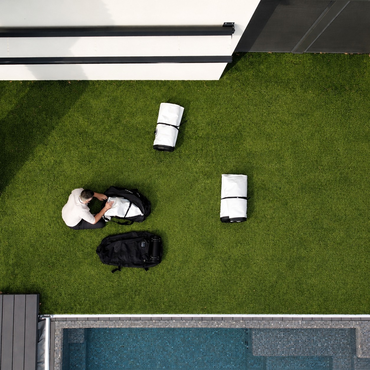 Airmaan M Sofa packed down into portable rolled bundles