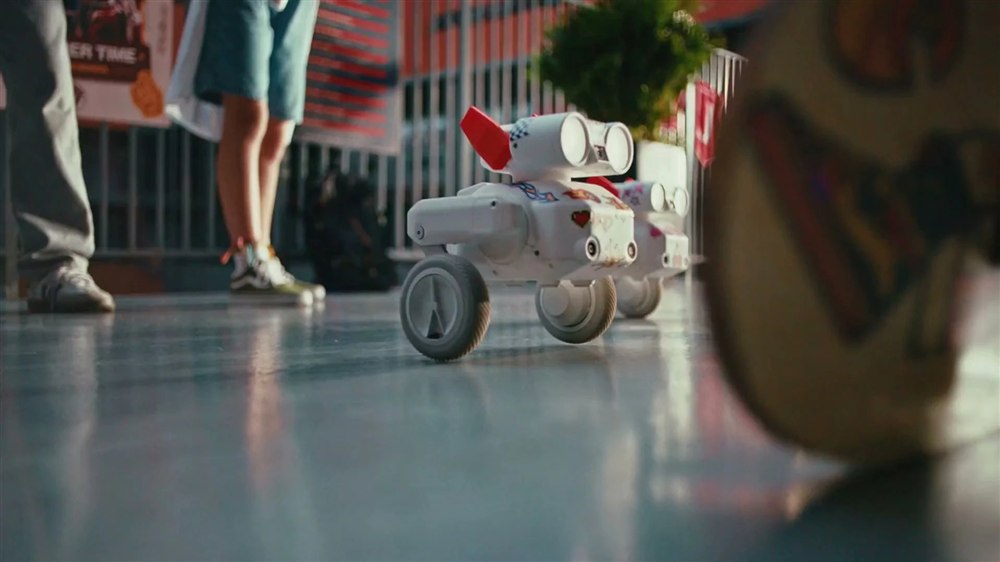 Mondo Robotics Beni camera robot rolling near people on a court