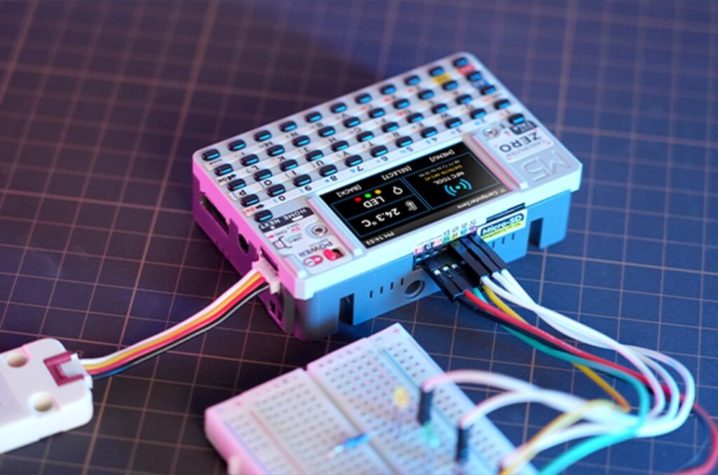 CardputerZero hardware tinkering setup with modules and electronics
