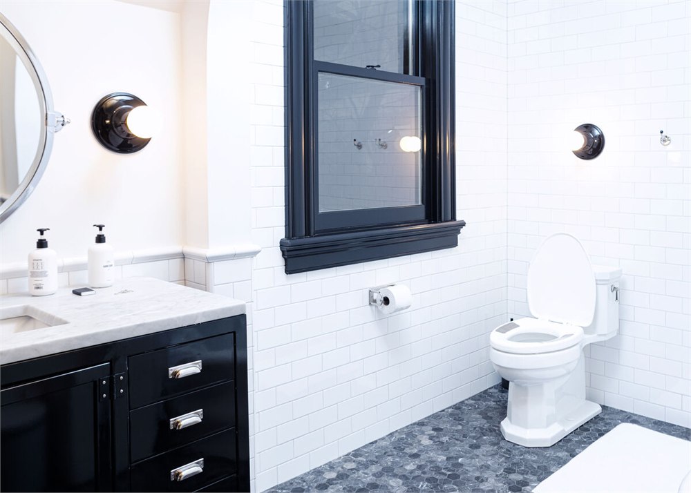 Wide bathroom view with the Casana Smart Seat on a toilet