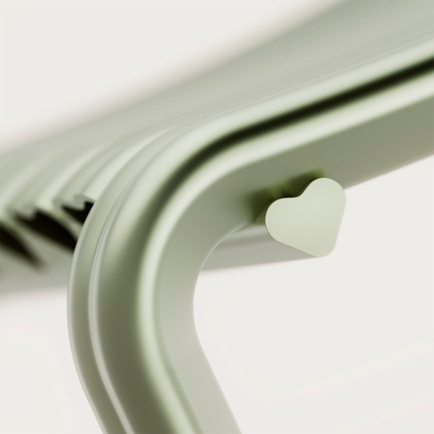 Heart-shaped aluminum profile detail on the Close to Heart chair frame