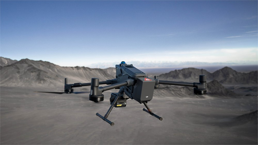 DJI Matrice 400 enterprise drone with AP100 parachute system on a test range