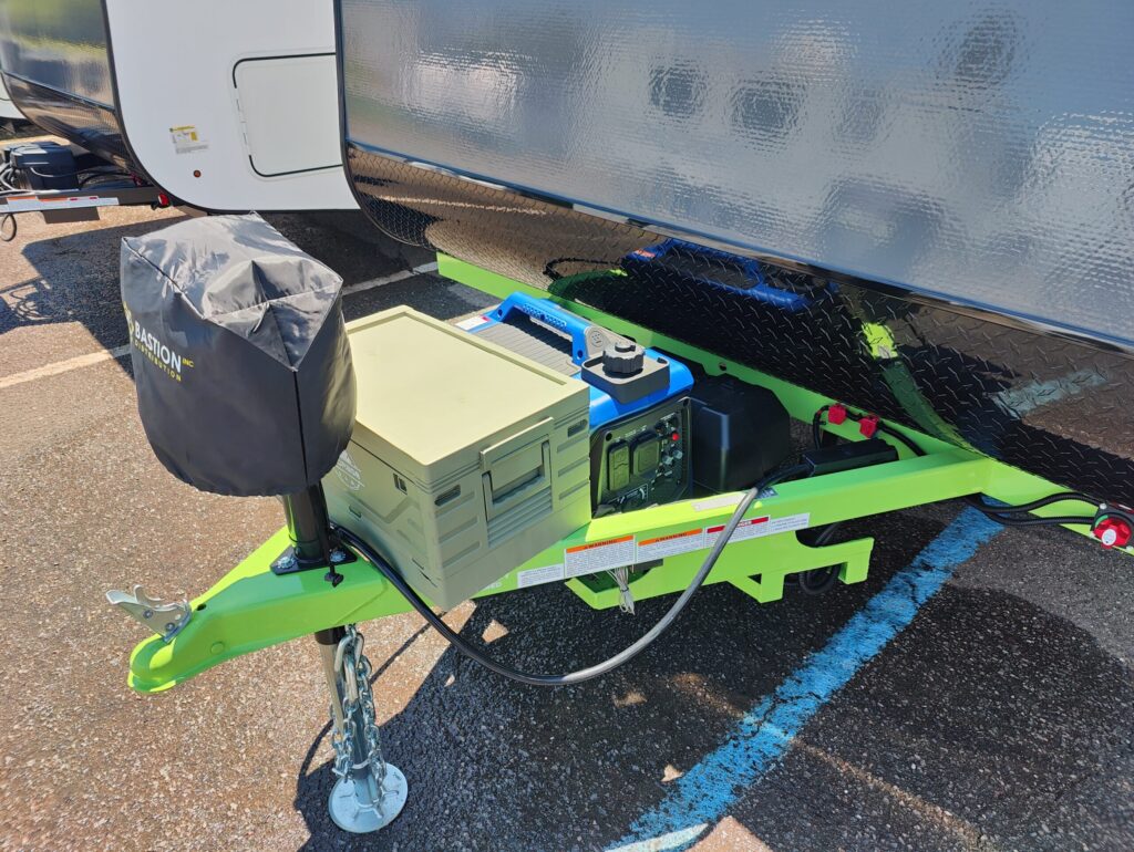Lightning Green composite chassis underneath the LIV E-Leaf OffRoad camper