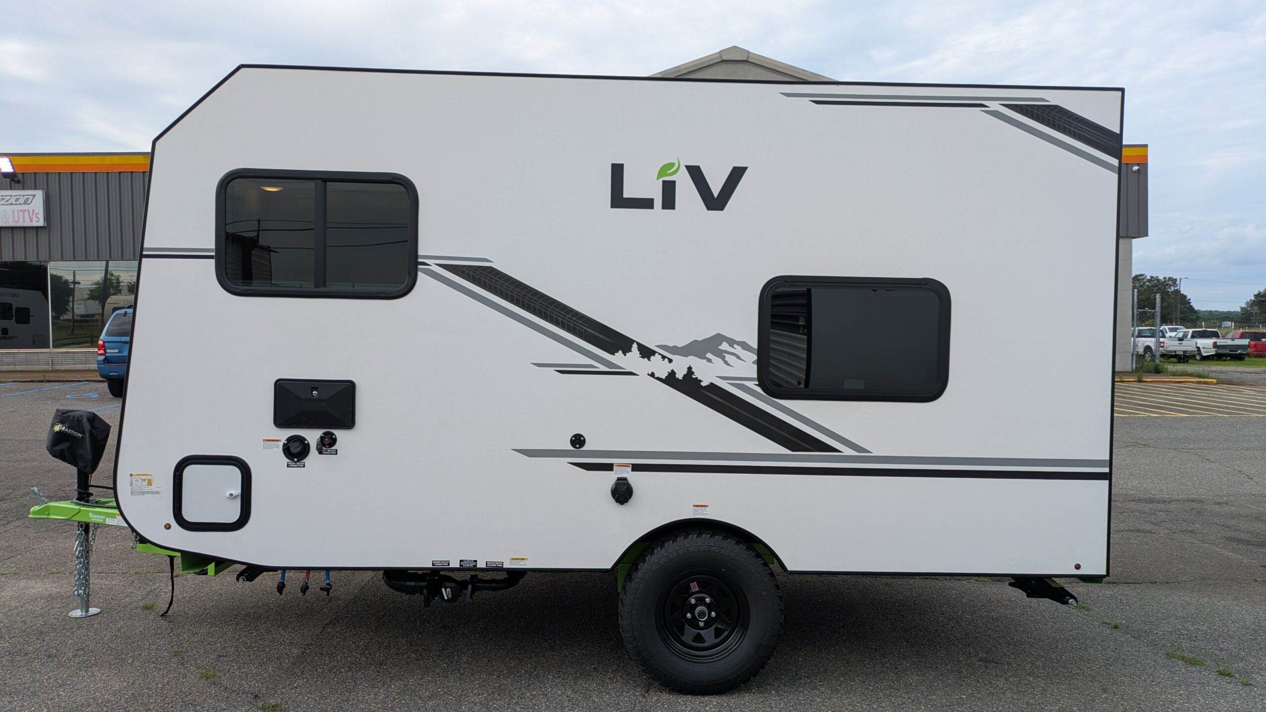 Side profile of the LIV E-Leaf OffRoad compact thermoplastic camper trailer