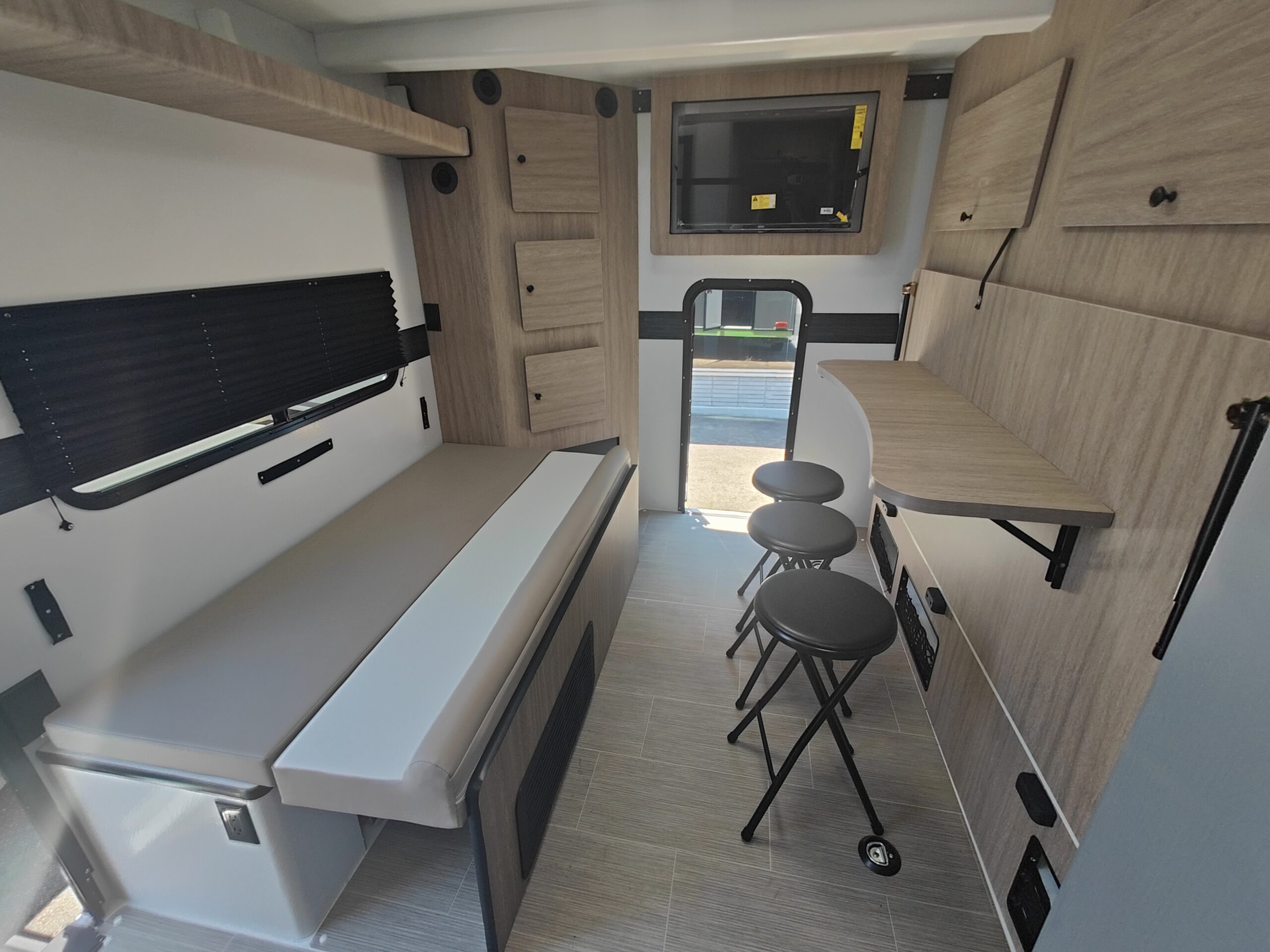 Lounge and bar seating layout in the LIV E-Leaf OffRoad camper