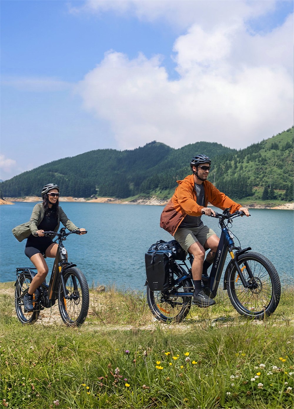 Riders using the ENGWE E26 3.0 Pro e-bike by a lake