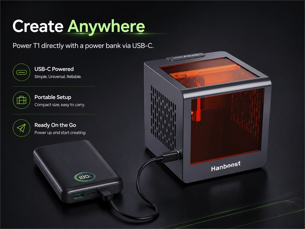Hanboost T1 connected to a USB-C power bank for portable engraving