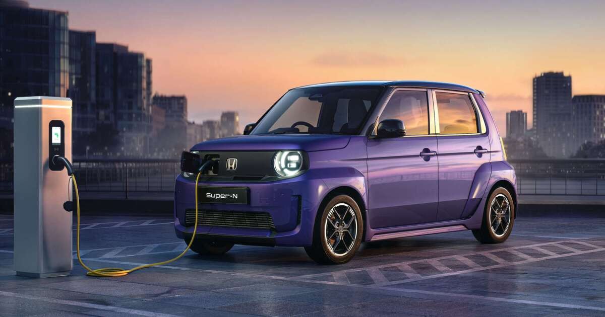Honda Super-N compact electric city car plugged into a charging station