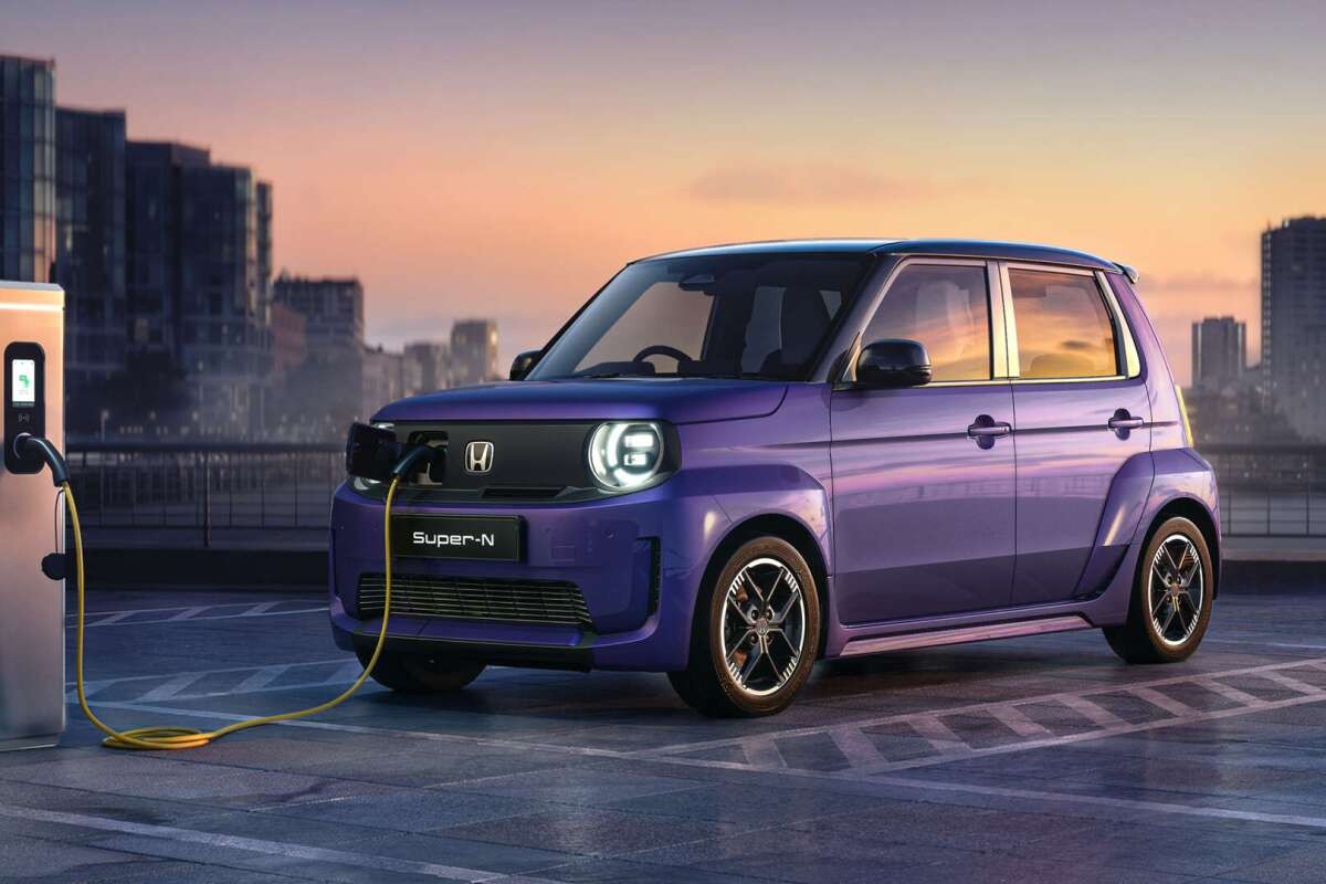 Purple Honda Super-N compact electric city car in an urban setting