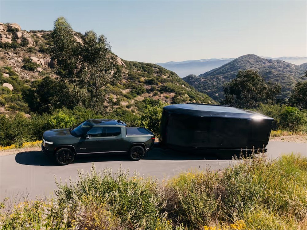 Aboard T4 hybrid-electric travel trailer being towed on a mountain road