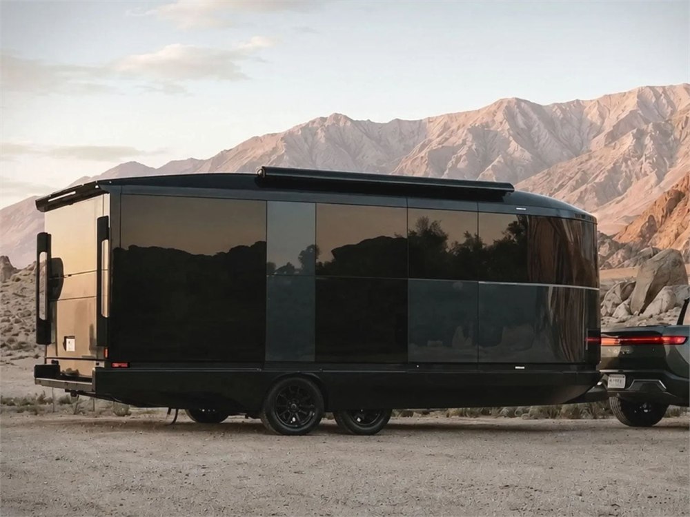 Aboard T4 travel trailer exterior in outdoor setting