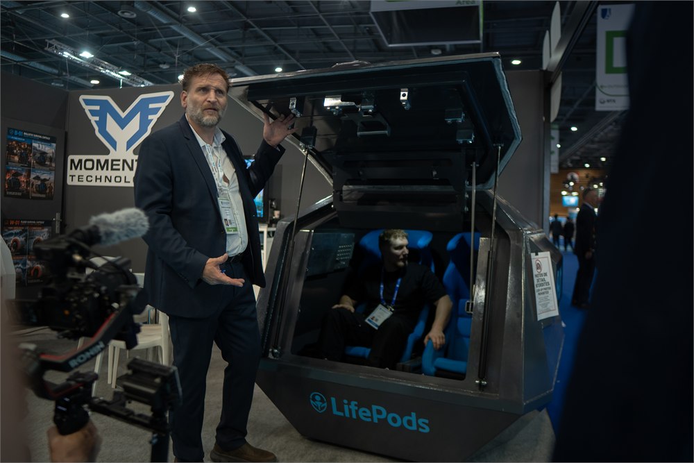 Momentum Technologies LifePods protective capsule shown with company founder Cedric Choffat