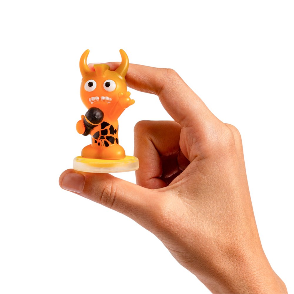 A Loops Lab collectible musician figurine held between fingers