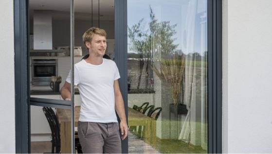 Neher swing screen door shown partly open for easy hanging and removal