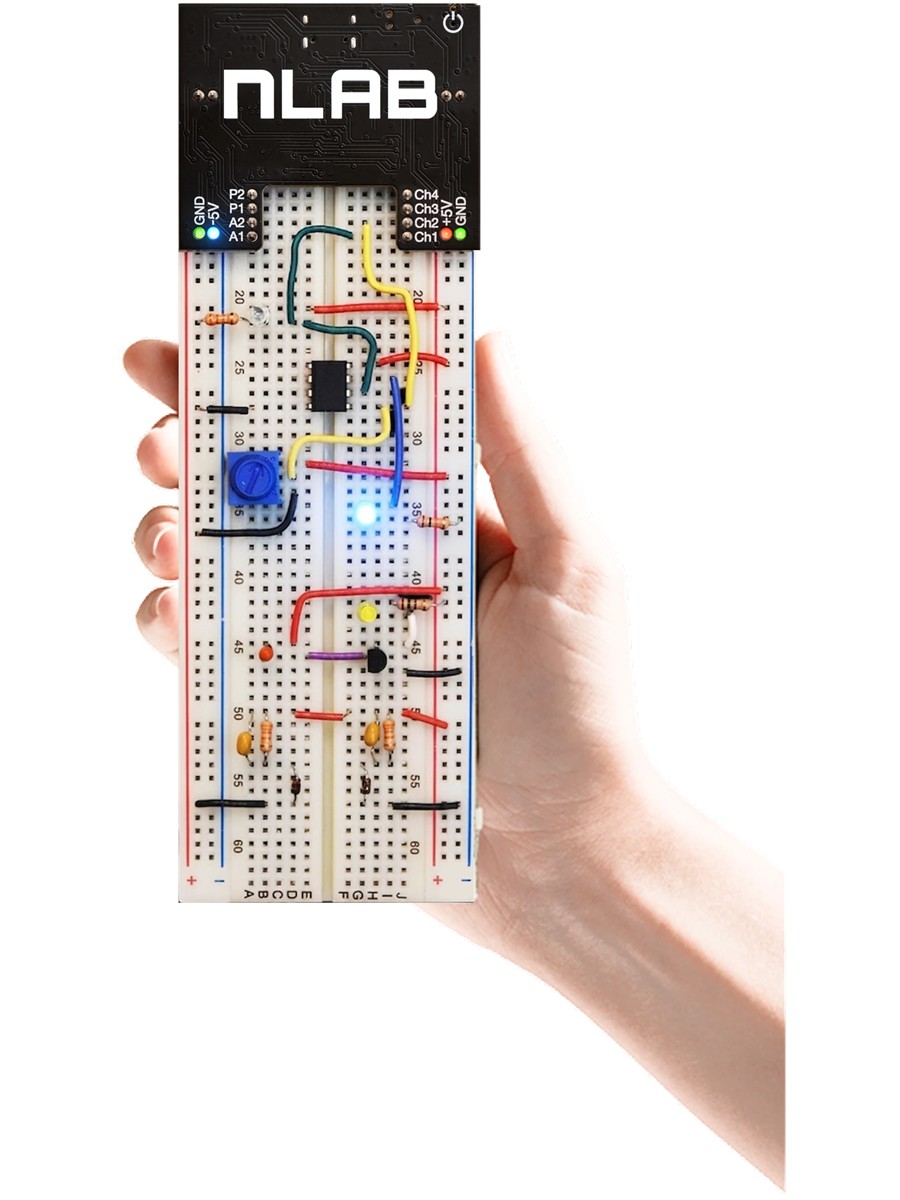 Full view of nLab mounted on a breadboard with jumper wires and components