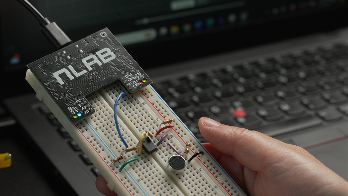 nLab electronics lab connected by USB while mounted on a breadboard