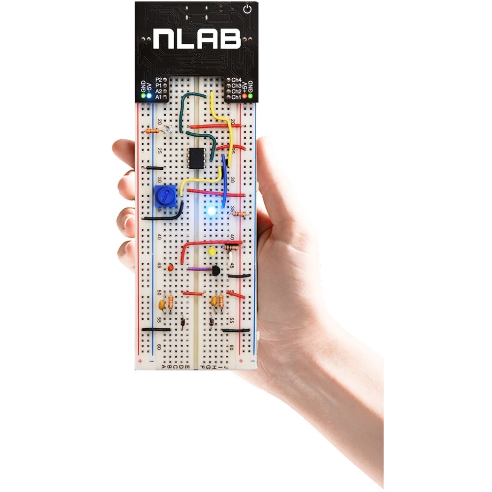 Hand holding an nLab module and breadboard with jumper wires