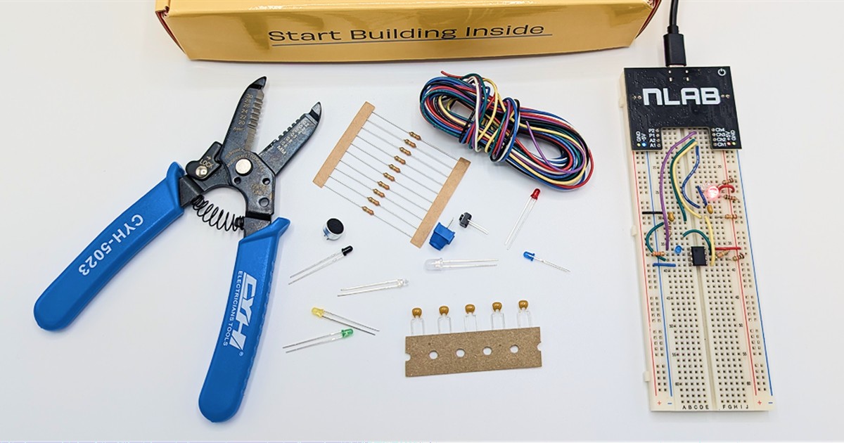 nLab kit layout with breadboard, wires, LEDs, resistors, and wire cutters