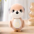 Poketomo pocket AI companion robot on a warm tabletop
