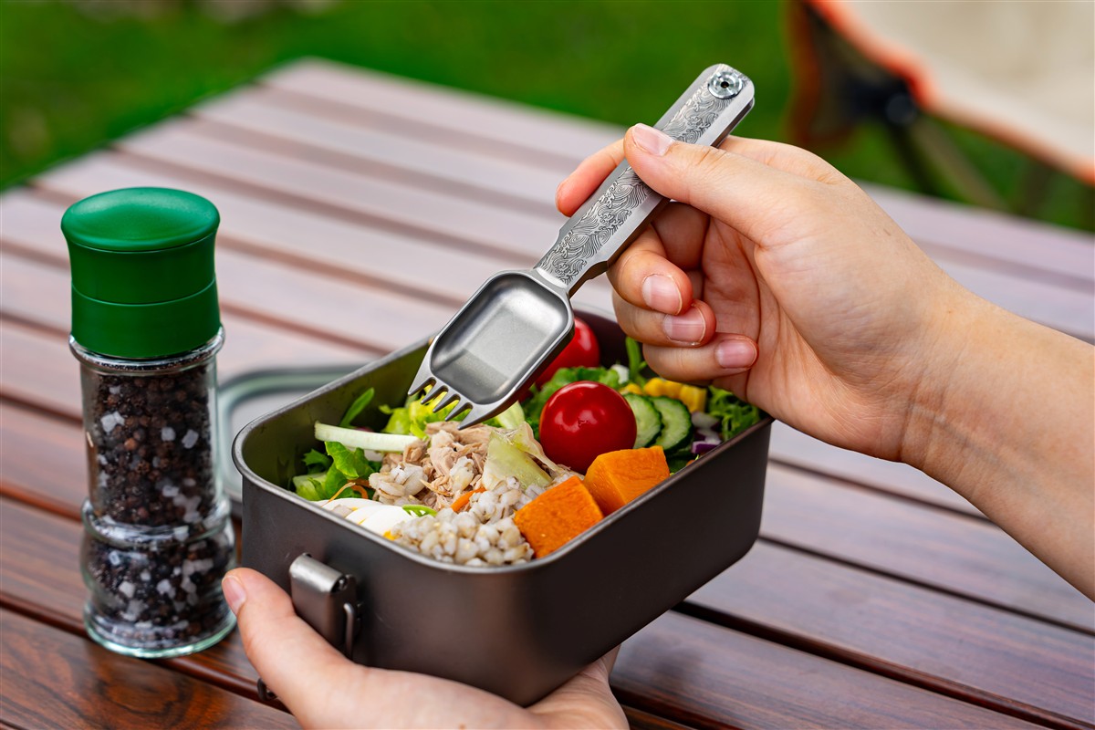 The ProperGear FieldSpork with its spoon fork head and folding handle opened for camp meals