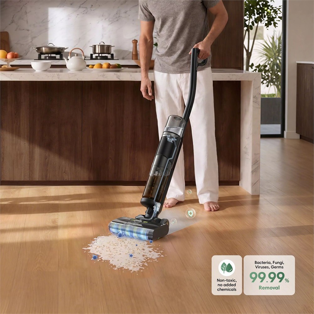 Roomba Electro Plus cleaning a hard kitchen floor