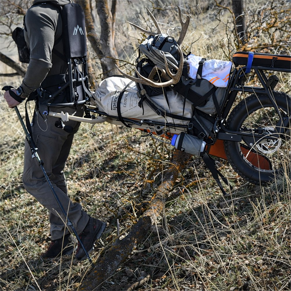 Close-up view of the RuckTruck outdoor utility cart frame and wheel