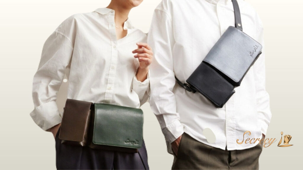 Secrecy CENTER BAG worn as a compact leather crossbody bag