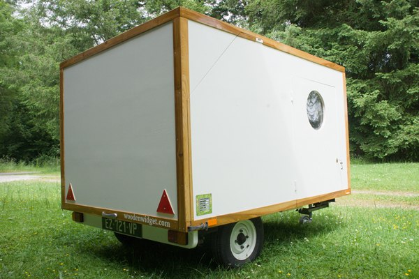 Woodenwidget Slidabox compact white trailer body with circular side window