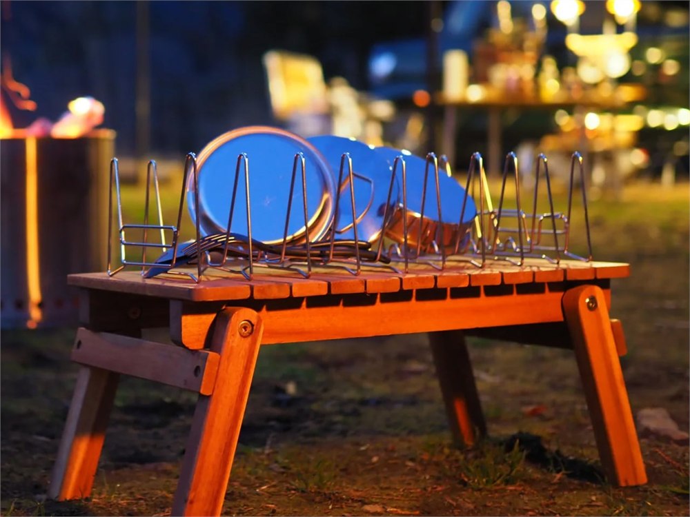 Slim Fold Dish Rack being used outdoors for camping dish drying