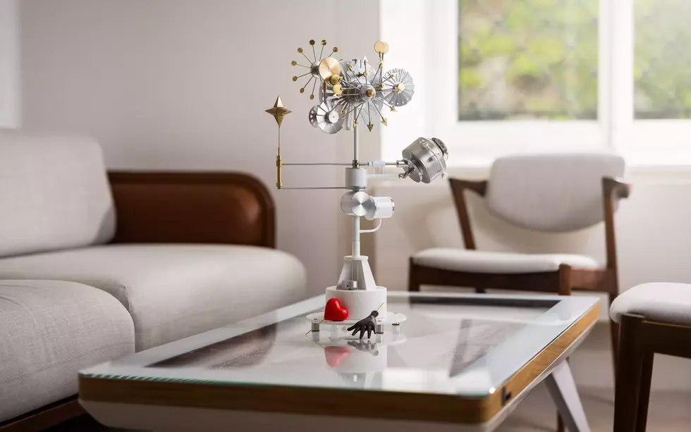 MB&F M.A.D.Gallery Solar Orbiter watch winder displayed on a living room table