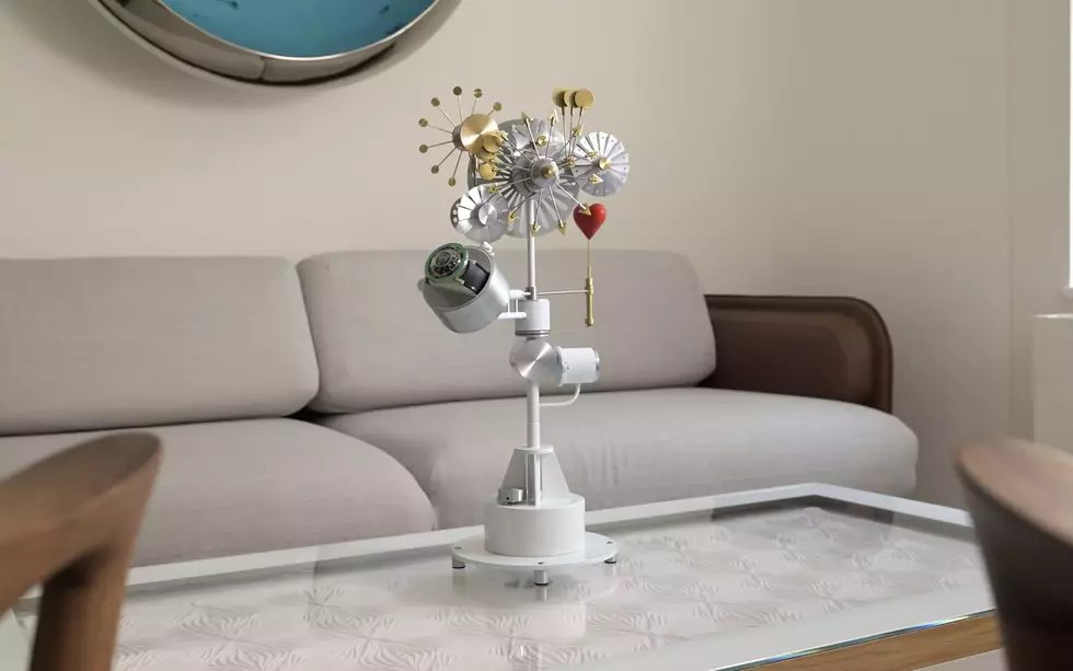 Solar Orbiter kinetic sculpture watch winder shown from the front with watch cup and brass details