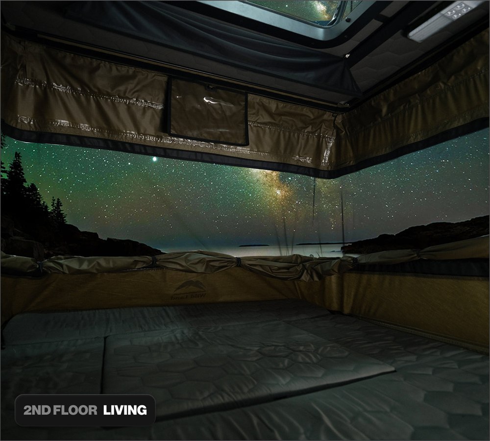 Wingman second-floor sleeping room with panoramic mesh and skylight views