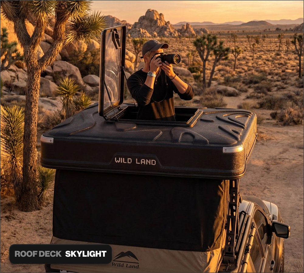 Wingman rooftop skylight hatch open above the elevated camper