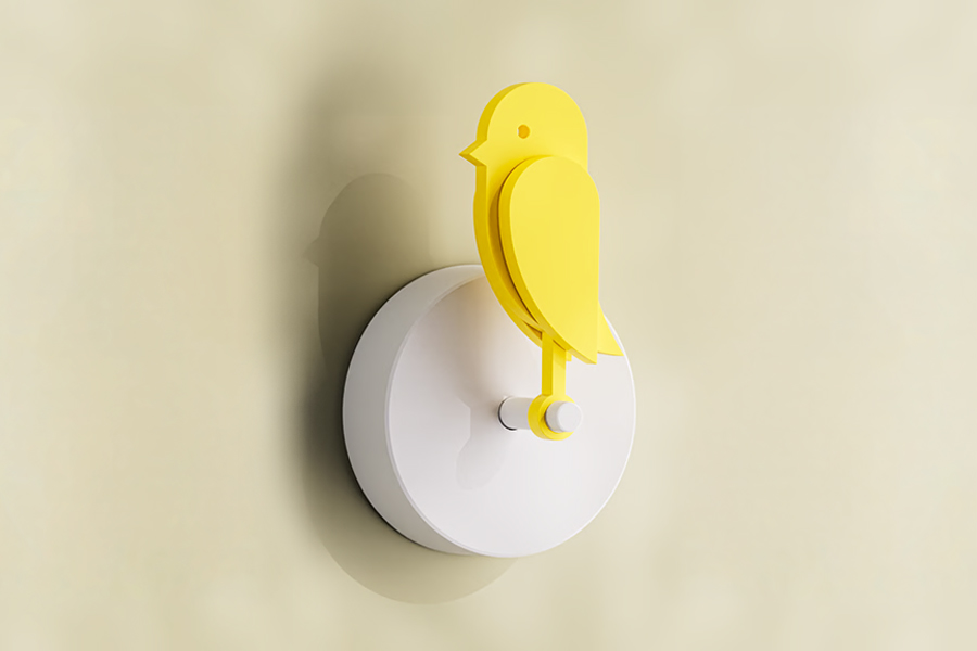 Birdie Pro wall-mounted yellow bird air monitor