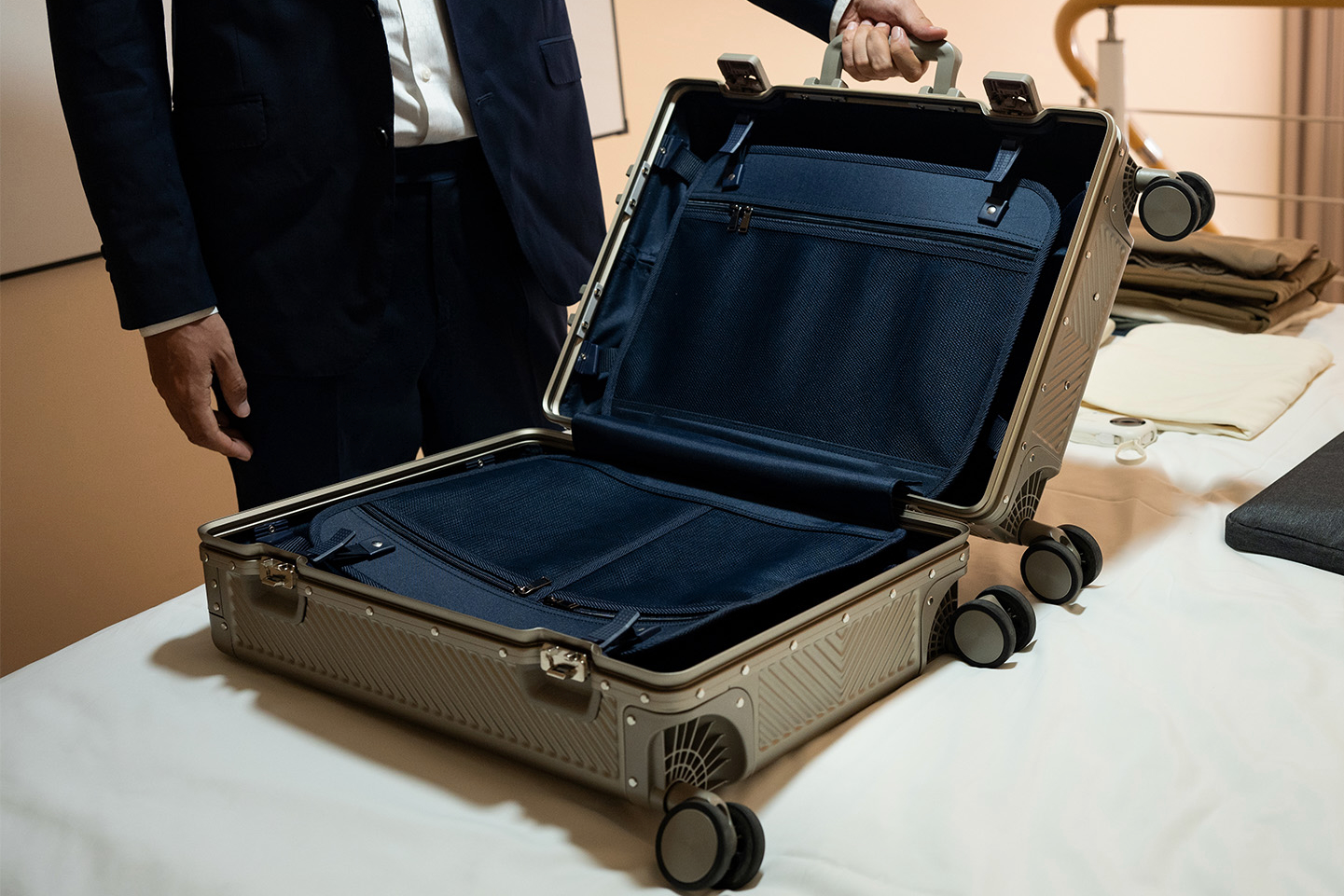 Titaner Voyager titanium carry-on shown with its listed cabin-size dimensions