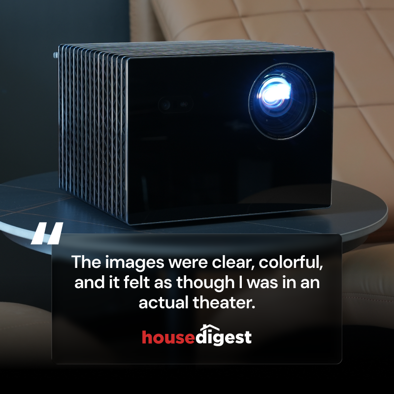 Valerion VisionMaster Max projector on a table with review quote