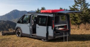 Vantrack LightCamp Kia PV5 electric camper conversion with rooftop tent and rear cook station