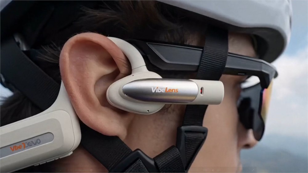 Close view of the VibeLens MusicCam Pro camera module beside the ear
