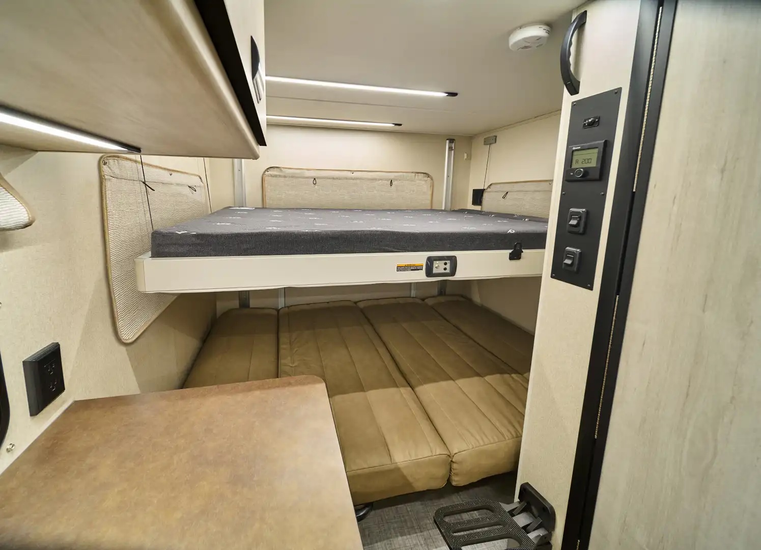 Winnebago Elora/Resa powered bunk bed above the rear lounge