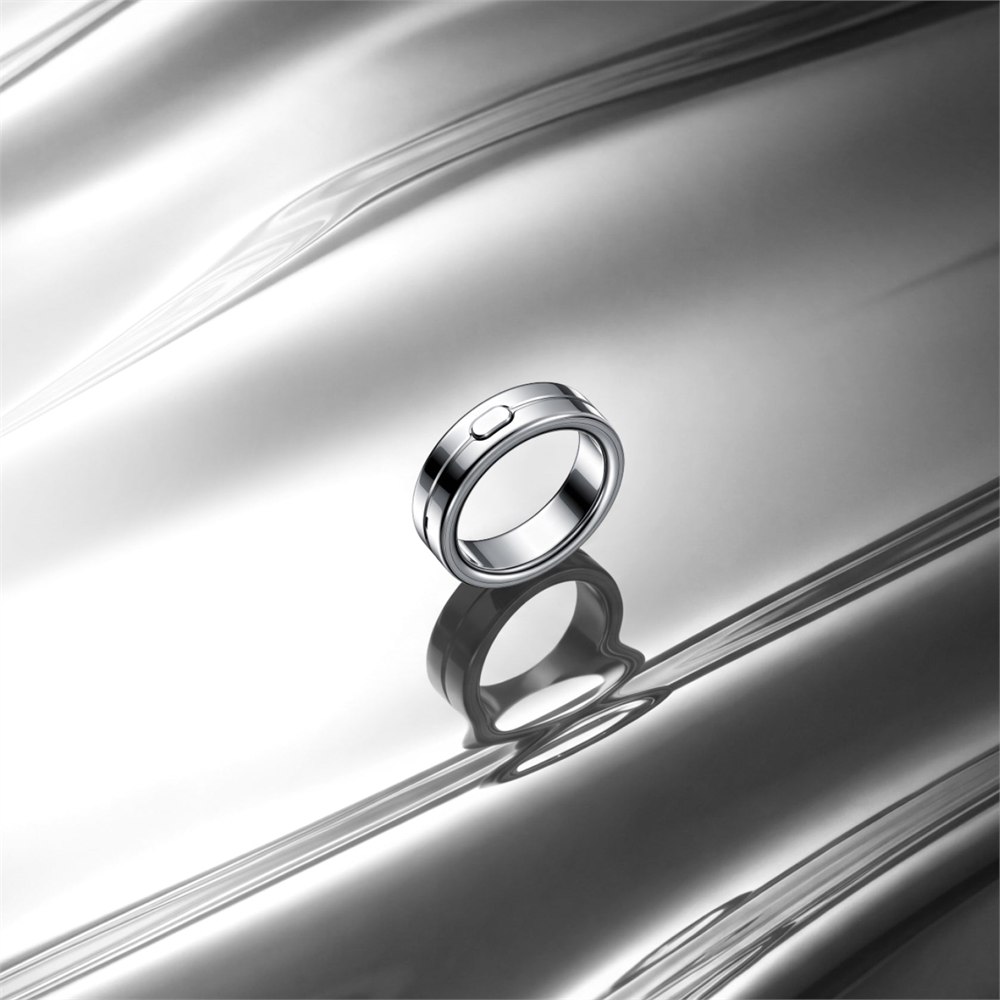 Vocci AI voice-recording ring on a reflective surface