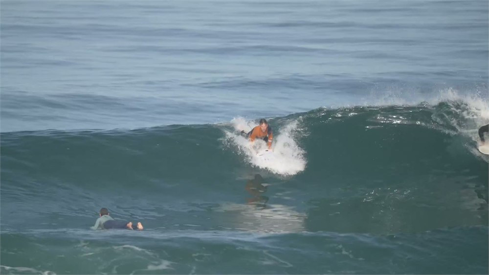 ATACH modular surfboard shown as three separate travel sections