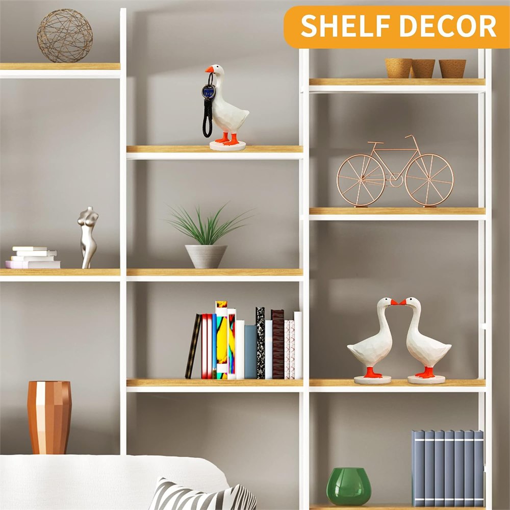 Magnetic goose key holders displayed on shelves as small decor