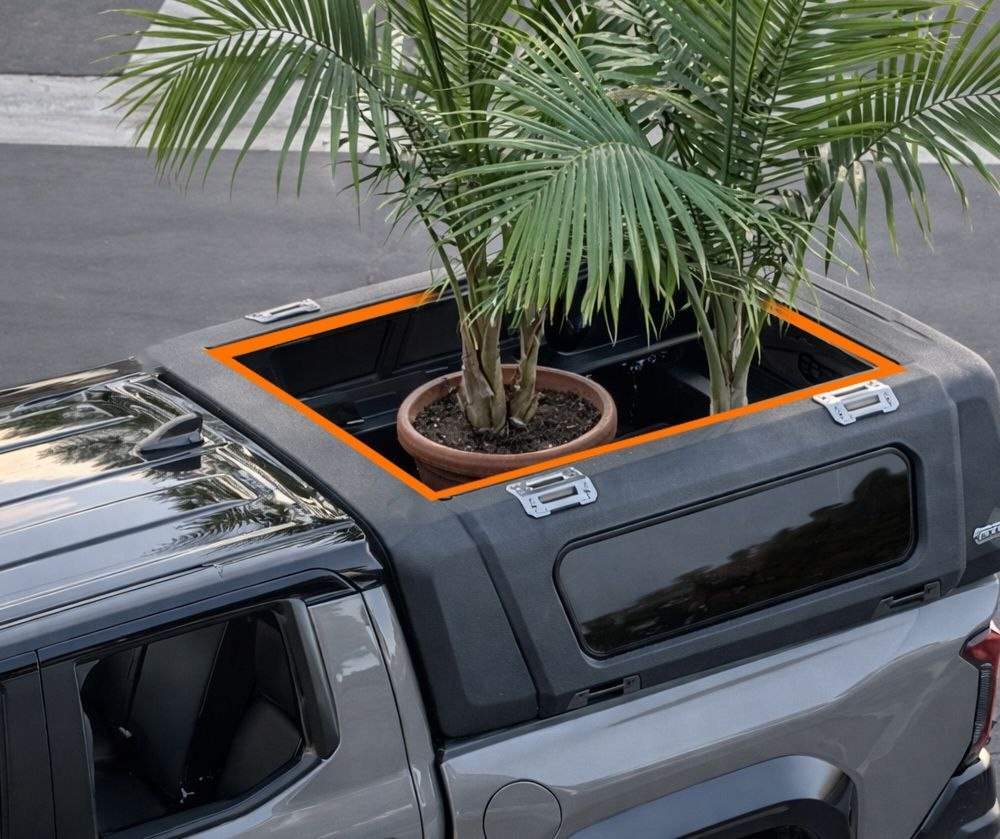 ADV-BOX removable roof panel opening on a pickup truck cap