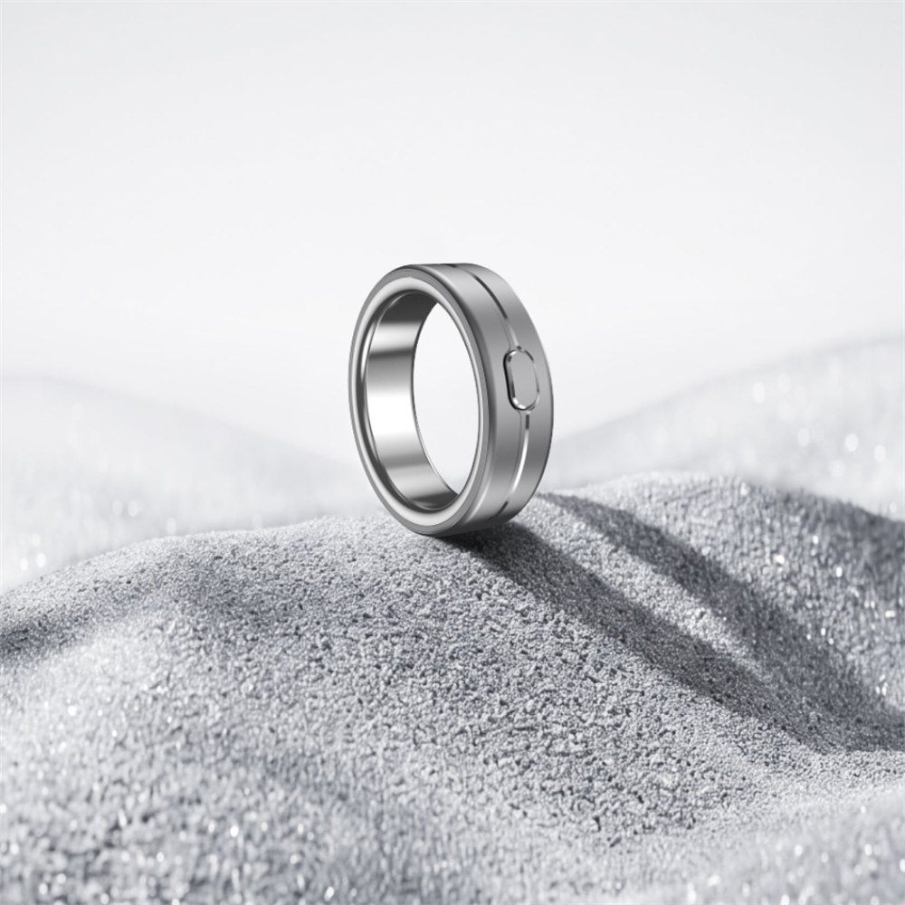 Silver Vocci Ring on a textured surface