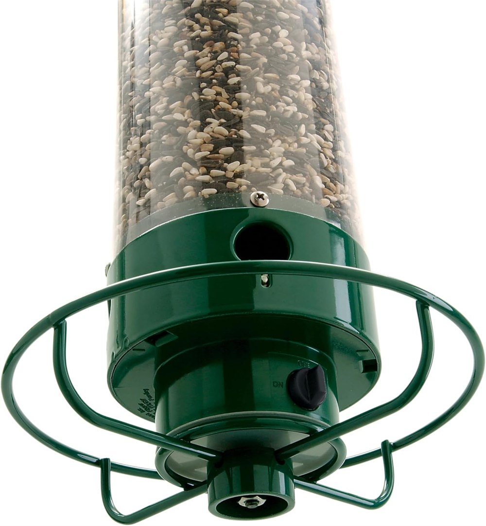 Close-up of the green rotating perch and feeding ports